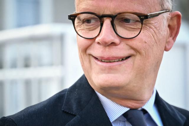 Le Havre's incumbent mayor and Horizons party candidate for his re-election Edouard Philippe arrives to cast his vote during the second round of France's 2026 municipal elections in Le Havre, Northeastern France on March 22, 2026. (Photo by LOU BENOIST / AFP)