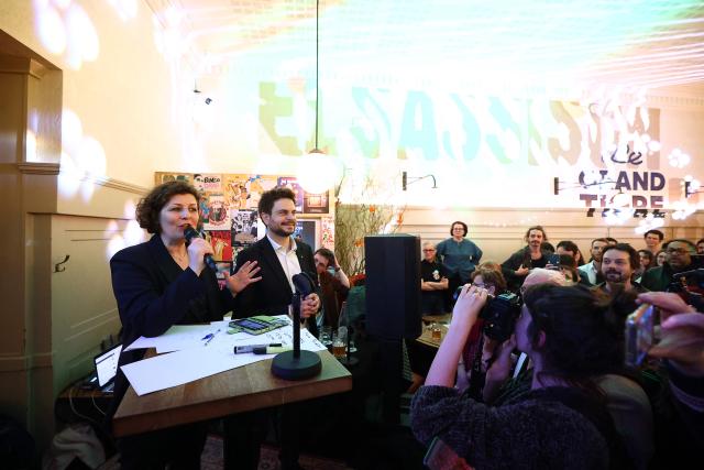 Strasbourg's incumbent mayor and Les Ecologistes candidate for re-election Jeanne Barseghian (L) delivers a speech during an election evening for the second round of France's 2026 municipal elections in Strasbourg, eastern France on March 22, 2026. (Photo by FREDERICK FLORIN / AFP)