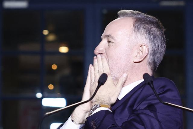 Socialistes et Apparentes' MP and Paris' Mayoral candidate Emmanuel Gregoire acknowledges his supporters after his victory following the announcement of official results of the second round of France's 2026 municipal elections, at the Rotonde Stalingrad venue in Paris on March 22, 2026. (Photo by Kenzo TRIBOUILLARD / AFP)