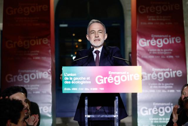 Socialistes et Apparentes' MP and Paris' Mayoral candidate Emmanuel Gregoire addresses supporters during the party's rally after winning the second round of France's 2026 municipal elections, at the Rotonde Stalingrad in Paris on March 22, 2026. (Photo by Kenzo TRIBOUILLARD / AFP)