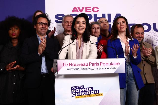 Paris' Left-wing La France Insoumise (LFI) Mayoral candidate Sophia Chikirou is applauded after she addressed supporters during the party rally following the results of the second round of France's 2026 municipal elections at the LFI headquarters in Paris on March 22, 2026. (Photo by Zakaria ABDELKAFI / AFP)