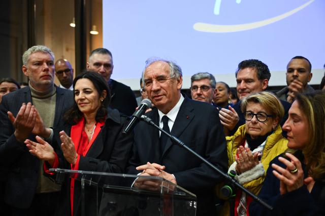 Pau's incumbent mayor and centrist MoDem mayoral candidate for re-election Francois Bayrou (C) reacts after loosing following the results of the second round of France's 2026 municipal elections in Pau, southwestern France on March 22, 2026. (Photo by GAIZKA IROZ / AFP)