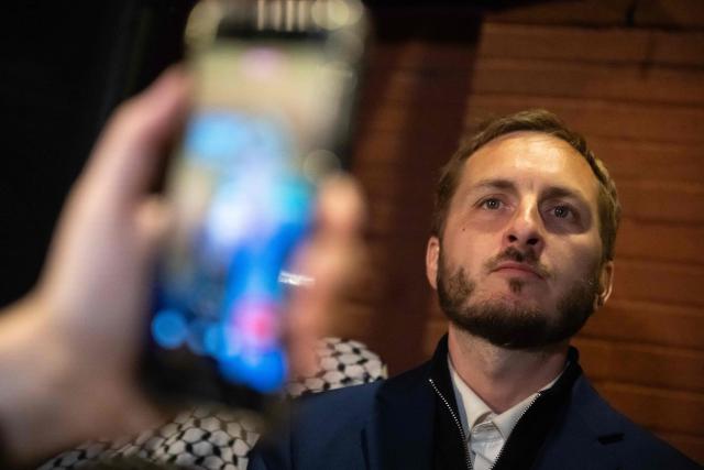 France's left-wing party La France Insoumise (LFI) MP and Toulouse's mayoral candidate François Piquemal is pictured as he adresses people following the announcement of his defeat after the second round of France's 2026 municipal elections in Toulouse, southwestern France, on March 22, 2026. (Photo by Lionel BONAVENTURE / AFP)