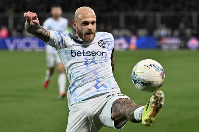 Inter Milan's Italian defender #32 Federico Dimarco controls the ball during the Italian Serie A football match between Fiorentina and Inter Milan at the Artemio Franchi Stadium in Florence on March 22, 2026. (Photo by Tiziana FABI / AFP)