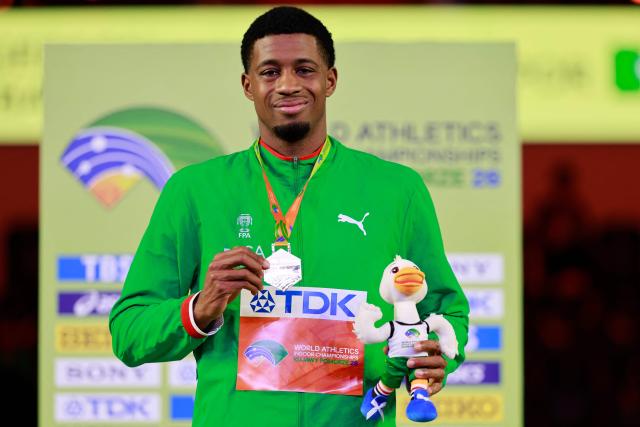 Gold medallist Portugal's Gerson Balde celebrates on the podium for the men's long jump event during the World Athletics Indoor Championships Kujawy Pomorze 2026 in Torun, Poland on March 22, 2026. (Photo by Wojtek RADWANSKI / AFP)