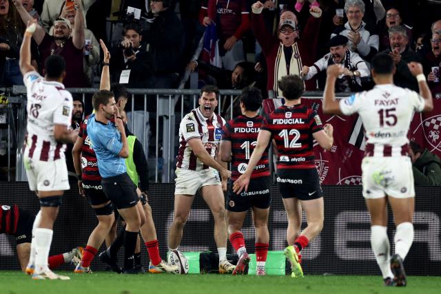 Bordeaux-Begles' French wing Damian Penaud (C) reacts after his try during the French Top14 rugby union match between Union Bordeaux-Begles (UBB) and Toulouse at the Stade Atlantique Bordeaux Metropole in Bordeaux, south-western France, on March 22, 2026. (Photo by ROMAIN PERROCHEAU / AFP)