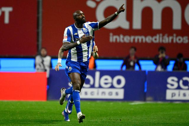 FC Porto's Ivorian midfielder #42 Seko Fofana celebrates after scoring his team's second goal during the Portuguese League football match between SC Braga and FC Porto at Municipal stadium of Braga on March 22, 2026. (Photo by Miguel RIOPA / AFP)