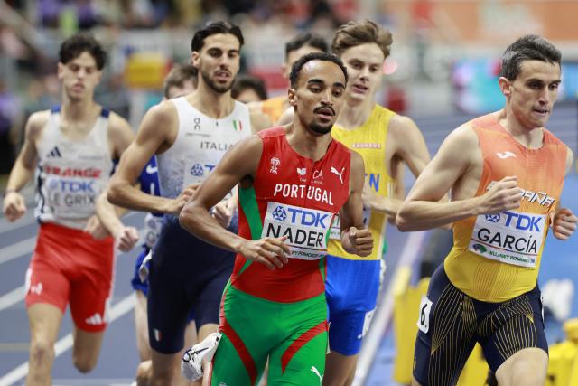 Portugal's Isaac Nader (L) and Spain's Mariano García compete in the men's final 1500 metres event during the World Athletics Indoor Championships Kujawy Pomorze 2026 in Torun, Poland on March 22, 2026. (Photo by Wojtek RADWANSKI / AFP)