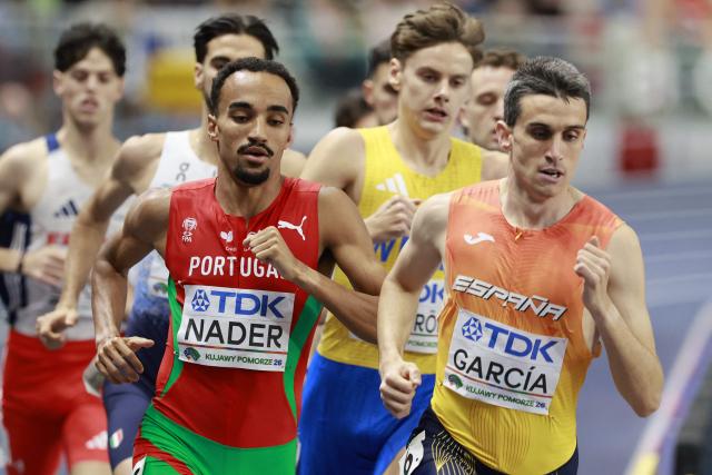 Portugal's Isaac Nader (L) and Spain's Mariano García compete in the men's final 1500 metres event during the World Athletics Indoor Championships Kujawy Pomorze 2026 in Torun, Poland on March 22, 2026. (Photo by Wojtek RADWANSKI / AFP)