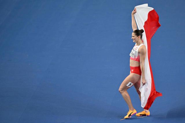 Poland's Pia Skrzyszowska celebrates after the women's final 60 metres hurdles event during the World Athletics Indoor Championships Kujawy Pomorze 2026 in Torun, Poland on March 22, 2026. (Photo by Andrej ISAKOVIC / AFP)