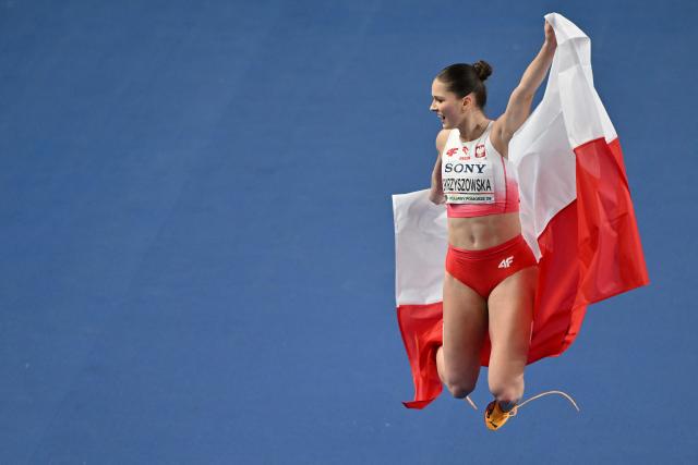 Poland's Pia Skrzyszowska celebrates after the women's final 60 metres hurdles event during the World Athletics Indoor Championships Kujawy Pomorze 2026 in Torun, Poland on March 22, 2026. (Photo by Andrej ISAKOVIC / AFP)