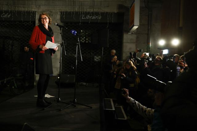 Left-wing and ecologist alliance mayoral candidate for Grenoble, Laurence Ruffin (L) addresses supporters after she won the second round of France's 2026 municipal elections in Grenoble, southeastern France on March 22, 2026. (Photo by Maxime Gruss / AFP)