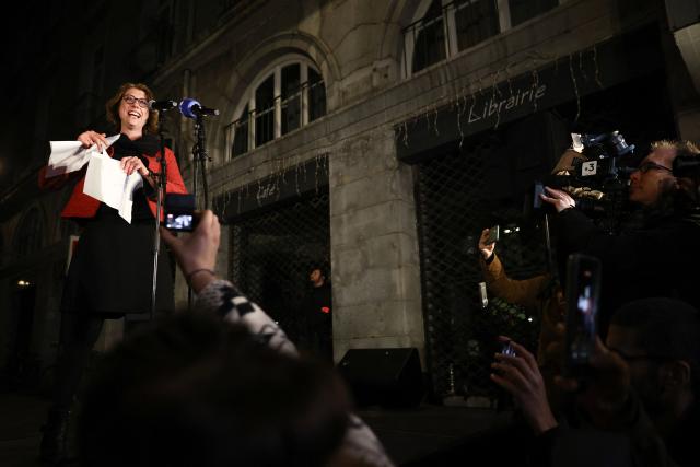 Left-wing and ecologist alliance mayoral candidate for Grenoble, Laurence Ruffin (L) addresses supporters after she won the second round of France's 2026 municipal elections in Grenoble, southeastern France on March 22, 2026. (Photo by Maxime Gruss / AFP)