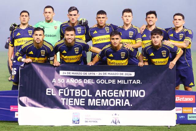 Boca Juniors players pose for a team photo ahead of the Argentine Professional Football League 2026 Apertura Tournament match between Boca Juniors and Instituto de Cordoba at La Bombonera Stadium in Buenos Aires on March 22, 2026. (Photo by ALEJANDRO PAGNI / AFP)