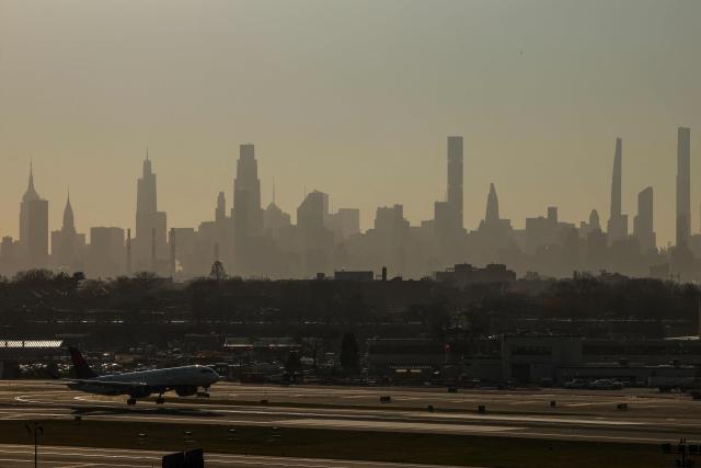 A Delta Airlines Airbus A220-300 passenger plane lands at LaGuardia Airport in New York, on March 22, 2026. (Photo by CHARLY TRIBALLEAU / AFP)