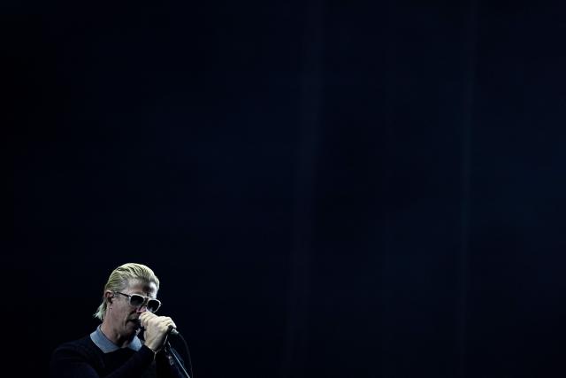 British-US singer Paul Banks, from the US rock band Interpol, performs during the third day of the Estereo Picnic music festival at the Simon Bolivar park in Bogota on March 22, 2026. (Photo by Alejandro GONZALEZ / AFP)