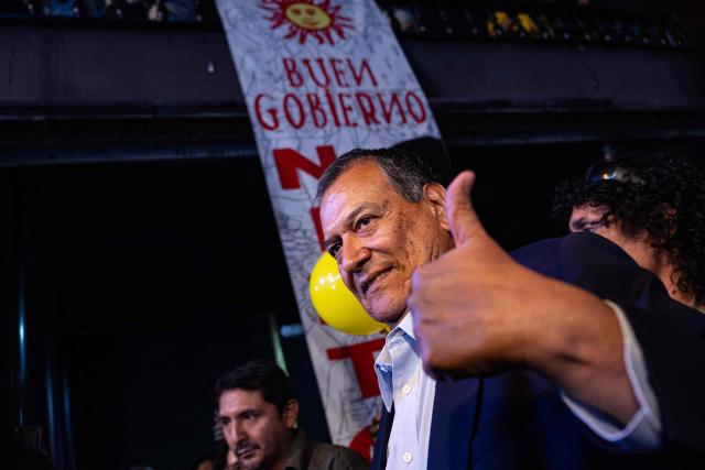 Peru's presidential candidate Jorge Nieto for the Buen Gobierno party, arrives for a campaign event in Lima on March 22, 2026. Peru will hold presidential elections on April 12. (Photo by ERNESTO BENAVIDES / AFP)