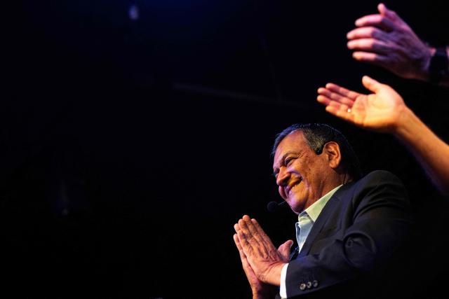 Peru's presidential candidate Jorge Nieto for the Buen Gobierno party, gestures to supporters during a campaign event in Lima on March 22, 2026. Peru will hold presidential elections on April 12. (Photo by ERNESTO BENAVIDES / AFP)