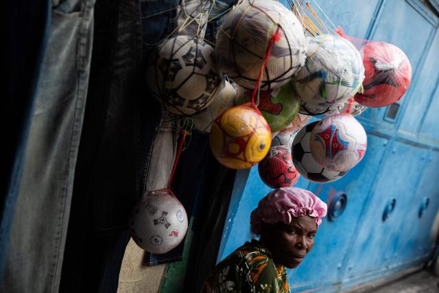 A shopkeeper sells footballs in downtown Port-au-Prince, Haiti, on March 21, 2026. (Photo by Clarens SIFFROY / AFP)