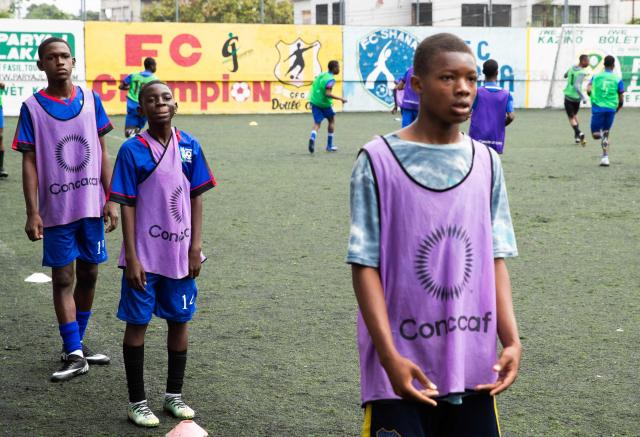 Children train their football skills in Petion-ville, Port-au-Prince, Haiti, on March 21, 2026. (Photo by Clarens SIFFROY / AFP)