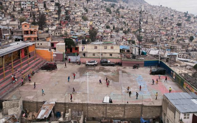 Children play soccer in Jalouzi, Port-au-Prince, Haiti, on March 21, 2026. (Photo by Clarens SIFFROY / AFP)