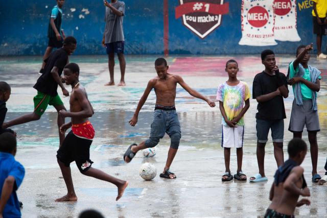 Children play soccer in Petion-ville, Port-au-Prince, Haiti, on March 20, 2026. (Photo by Clarens SIFFROY / AFP)