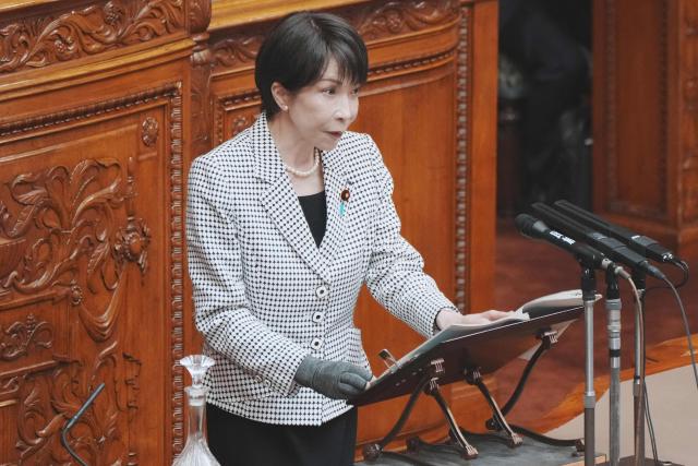 Japan's Prime Minister Sanae Takaichi answers questions during a plenary session of the House of Councillors at Parliament in Tokyo on March 23, 2026. (Photo by Kazuhiro NOGI / AFP)