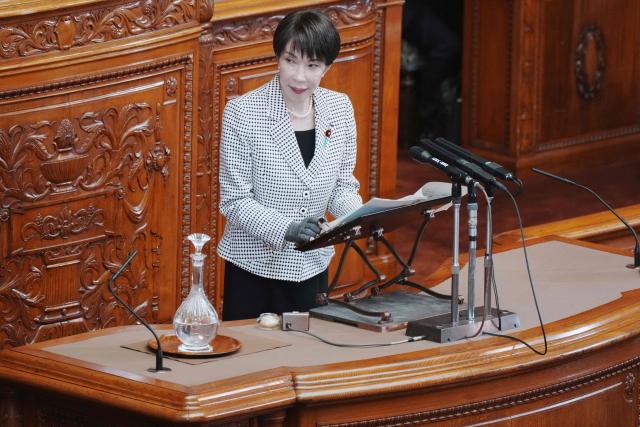 Japan's Prime Minister Sanae Takaichi answers questions during a plenary session of the House of Councillors at Parliament in Tokyo on March 23, 2026. (Photo by Kazuhiro NOGI / AFP)