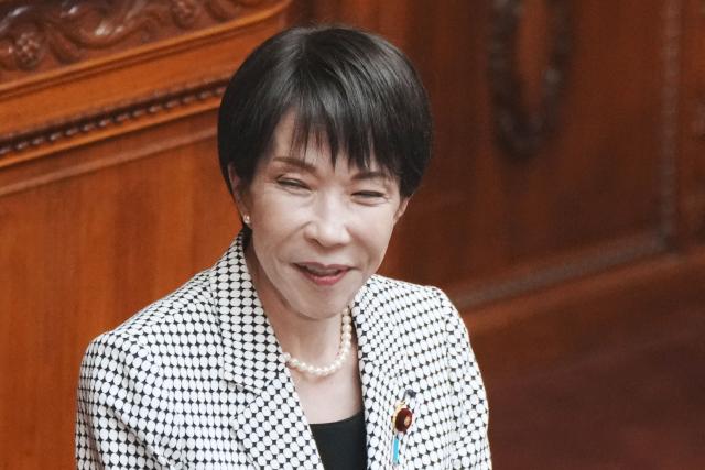 Japan's Prime Minister Sanae Takaichi answers questions during a plenary session of the House of Councillors at Parliament in Tokyo on March 23, 2026. (Photo by Kazuhiro NOGI / AFP)
