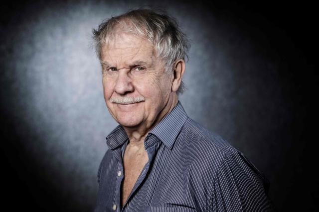 (FILES) Belgian graphic novel artist Huppen Hermann poses during a photoshoot at the 45th edition of the Angouleme International Comics Festival in Angouleme, southwestern France, on January 27, 2018. The Belgian comic book author Hermann, a mainstay of Tintin magazine and of Franco-Belgian comics, died on March 22, 2026 at the age of 88, the publishing house Le Lombard announced on March 23, 2026. (Photo by JOEL SAGET / AFP)