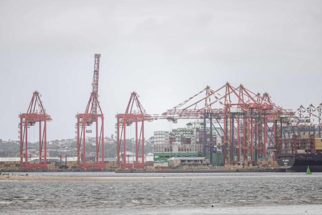 A general view of a cranes and containers at the Durban Harbour in Durban on March 23, 2026. (Photo by RAJESH JANTILAL / AFP)