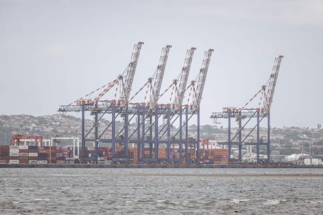 A general view of a cranes and containers at the Durban Harbour in Durban on March 23, 2026. (Photo by RAJESH JANTILAL / AFP)