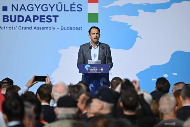 Belgian politician, leader of Vlaams Belang party Tom van Grieken addresses the audience during the first Patriotic Rally at the Millenaris Cultural Center in Budapest, Hungary, March 23, 2026, a key campaign event for the upcoming April elections. In the April 12, 2026 vote, Hungarian Prime Minister Viktor Orban is facing his toughest challenge since he returned to power in 2010, according to opinion polls, against a backdrop of a stagnating economy and growing discontent with public services, among other issues. (Photo by Attila KISBENEDEK / AFP)