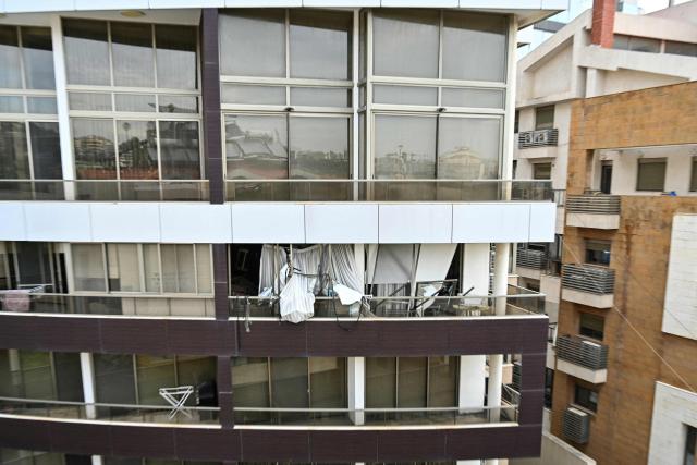A photograph shows the damage after an Israeli strike targeted an apartment in Hazmieh, on the eastern outskirts of Beirut, on March 23, 2026. An Israeli strike on Hazmieh east of Beirut killed at least one person, Lebanon's health ministry said on March 23, the second strike on the residential Christian area in the ongoing Israel-Hezbollah war. (Photo by FADEL itani / AFP)