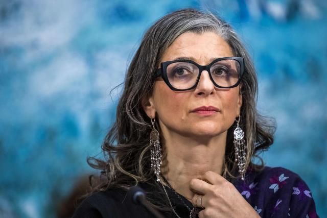 United Nations (UN) special rapporteur on the occupied Palestinian territories Francesca Albanese presents her latest report before delegates at the UN Rights Council, in Geneva, on March 23, 2026. (Photo by Fabrice COFFRINI / AFP)