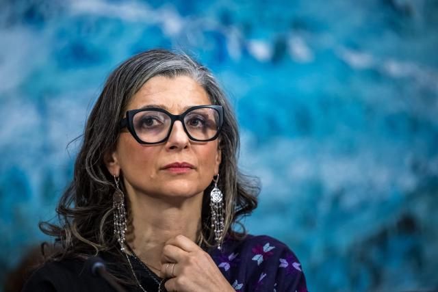 United Nations (UN) special rapporteur on the occupied Palestinian territories Francesca Albanese presents her latest report before delegates at the UN Rights Council, in Geneva, on March 23, 2026. (Photo by Fabrice COFFRINI / AFP)