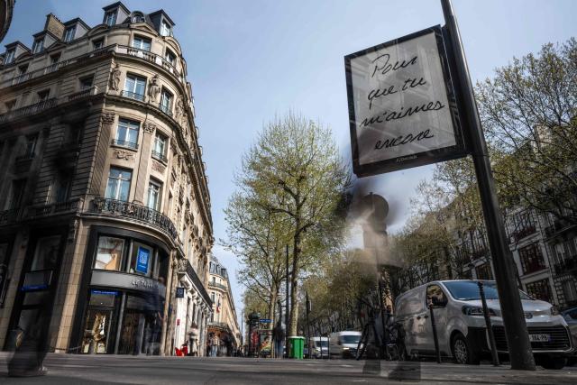 This photograph shows a billboard displaying the title of Canadian singer Celine Dion song "Pour que tu m'aimes encore" in central Paris on March 23, 2026. "Pour que tu m'aimes encore" or "My Heart Will Go On" can be read on mysterious posters in Paris, also featuring other iconic titles by Celine Dion and suggesting the big return of the Quebec diva for a series of concerts. (Photo by Blanca CRUZ / AFP)