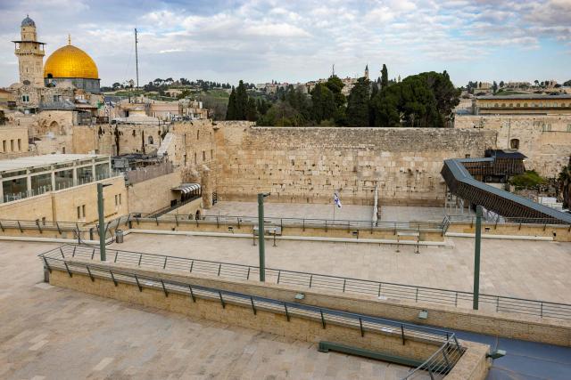 The Western Wall and the Dome of the Rock (L) are seen in Jerusalem's Old City on March 23, 2026. Since the United States and Israel unleashed strikes on Iran on February 28, war has spread across the Middle East, with casualties reported in countries across the region. (Photo by Odd ANDERSEN / AFP) / 