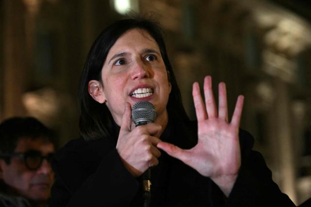 Elly Schlein, Secretary of Italian Democratic Party (PD), addresses supporters of the "No" to the Constitutional referendum on Justice reform as they celebrate their victory at Piazza Barberini in Rome on March 23, 2026. Italians voted against a referendum on justice proposed by Prime Minister Giorgia Meloni, in what would be a major blow for the far-right leader. With the ballots from more than a quarter of polling stations counted, the "No" vote in the constitutional referendum was ahead with more than 54 percent. (Photo by Andreas SOLARO / AFP)