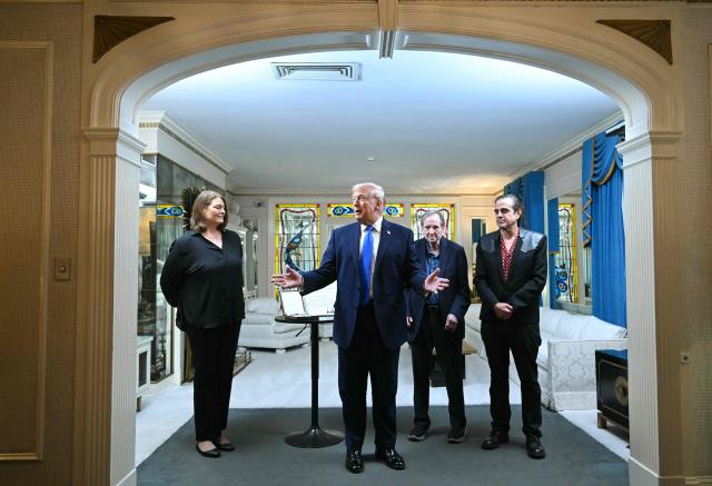 TOPSHOT - US President Donald Trump speaks as he visits Graceland, the estate of Elvis Presley, in Memphis, Tennessee on March 23, 2026. (Photo by SAUL LOEB / AFP)