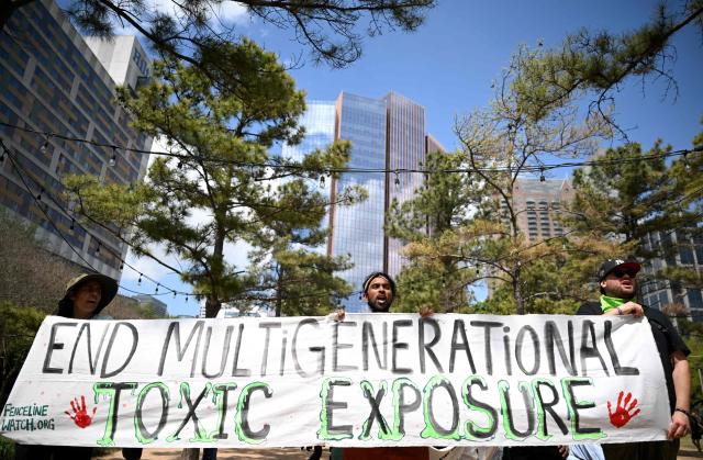 Demonstrators march to protest against the 2026 CERAWeek by S&P Global energy conference in Houston, Texas on March 23, 2026.  (Photo by RONALDO SCHEMIDT / AFP)