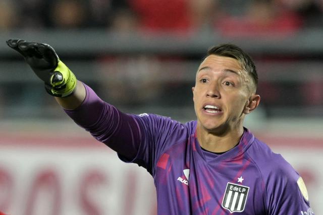 (FILES) Estudiantes' Uruguayan goalkeeper #16 Fernando Muslera gestures during the Copa Libertadores quarterfinal second leg football match between Argentina's Estudiantes de La Plata and Brazil's Flamengo at the Jorge Luis Hirschi Stadium in La Plata, Buenos Aires province, Argentina on September 25, 2025. With the return of veteran goalkeeper Fernando Muslera and striker Agustín Canobbio, Marcelo Bielsa announced a 28-man squad for Uruguay on March 23, 2026 ahead of their pre-World Cup friendlies against England and Algeria. (Photo by Juan MABROMATA / AFP)
