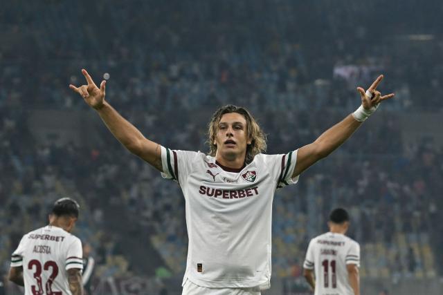 (FILES) Estudiantes' Uruguayan goalkeeper #16 Fernando Muslera gestures during the Copa Libertadores quarterfinal second leg football match between Argentina's Estudiantes de La Plata and Brazil's Flamengo at the Jorge Luis Hirschi Stadium in La Plata, Buenos Aires province, Argentina on September 25, 2025. With the return of veteran goalkeeper Fernando Muslera and striker Agustin Canobbio, Marcelo Bielsa announced a 28-man squad for Uruguay on March 23, 2026 ahead of their pre-World Cup friendlies against England and Algeria. (Photo by Mauro PIMENTEL / AFP)
