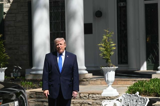 US President Donald Trump speaks to the press after departing from Graceland, the estate of Elvis Presley, in Memphis, Tennessee on March 23, 2026. (Photo by SAUL LOEB / AFP)