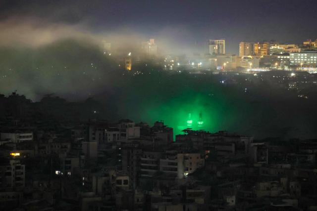 TOPSHOT - Smoke rises from the site of an Israeli airstrike that targeted an area in Beirut’s southern suburbs on March 23, 2026. An Israeli strike hit Beirut's southern suburbs on Monday, state media reported, hours after the Israeli army issued a warning for residents of the area to evacuate. Lebanon was pulled into the Middle East war when Hezbollah began firing rockets into Israel on March 2 to avenge the killing of Iran's supreme leader Ayatollah Ali Khamenei in US-Israeli strikes. (Photo by ibrahim AMRO / AFP)