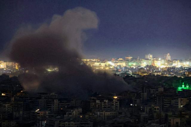 Smoke rises from the site of an Israeli airstrike that targeted an area in Beirut’s southern suburbs on March 23, 2026. An Israeli strike hit Beirut's southern suburbs on Monday, state media reported, hours after the Israeli army issued a warning for residents of the area to evacuate. Lebanon was pulled into the Middle East war when Hezbollah began firing rockets into Israel on March 2 to avenge the killing of Iran's supreme leader Ayatollah Ali Khamenei in US-Israeli strikes. (Photo by ibrahim AMRO / AFP)