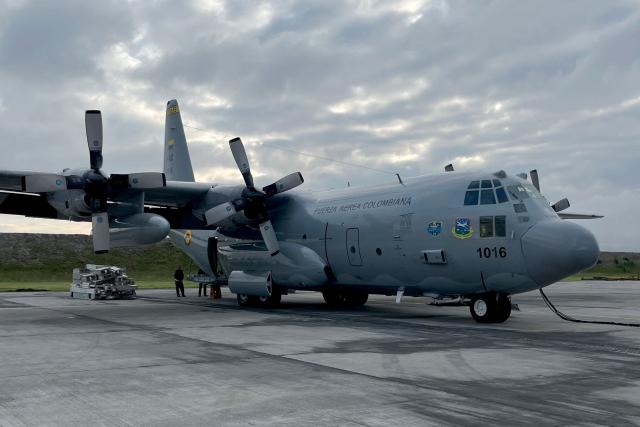 The Air Force Hercules 1016 sits on the tarmac of Catam air base in Bogota on March 20, 2026. A Colombian military plane carrying 125 troops and crew crashed on take off on March 23, 2026, with as many as 80 people aboard feared dead. The Hercules aircraft went down shortly after departure from Puerto Leguizamo, near the southern border with Ecuador, strewing burning wreckage on the jungle floor. (Photo by Luisa OROZCO / AFP)