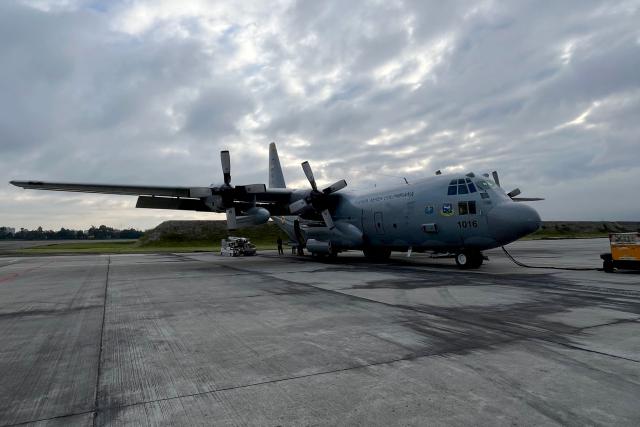 The Air Force Hercules 1016 sits on the tarmac of Catam air base in Bogota on March 20, 2026. A Colombian military plane carrying 125 troops and crew crashed on take off on March 23, 2026, with as many as 80 people aboard feared dead. The Hercules aircraft went down shortly after departure from Puerto Leguizamo, near the southern border with Ecuador, strewing burning wreckage on the jungle floor. (Photo by Luisa OROZCO / AFP)