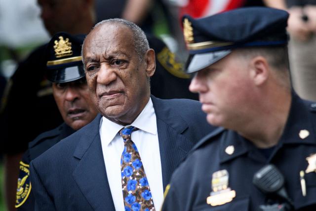 (FILES) US actor Bill Cosby arrives at court on September 24, 2018 in Norristown, Pennsylvania to face sentencing for sexual assault. A woman who said she was drugged and sexually assaulted by veteran US entertainer Bill Cosby was awarded more than $19 million on March 23, 2026 after a civil hearing in California. Donna Motsinger said she was working as a waitress more than 50 years ago when the performer began to target her. (Photo by Brendan Smialowski / AFP)