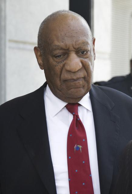 (FILES) US actor and comedian Bill Cosby comes out of the Courthouse after the verdict in the retrial of his sexual assault case at the Montgomery County Courthouse in Norristown, Pennsylvania on April 26, 2018. A woman who said she was drugged and sexually assaulted by veteran US entertainer Bill Cosby was awarded more than $19 million on March 23, 2026 after a civil hearing in California. Donna Motsinger said she was working as a waitress more than 50 years ago when the performer began to target her. (Photo by Dominick Reuter / AFP) / ALTERNATIVE CROP